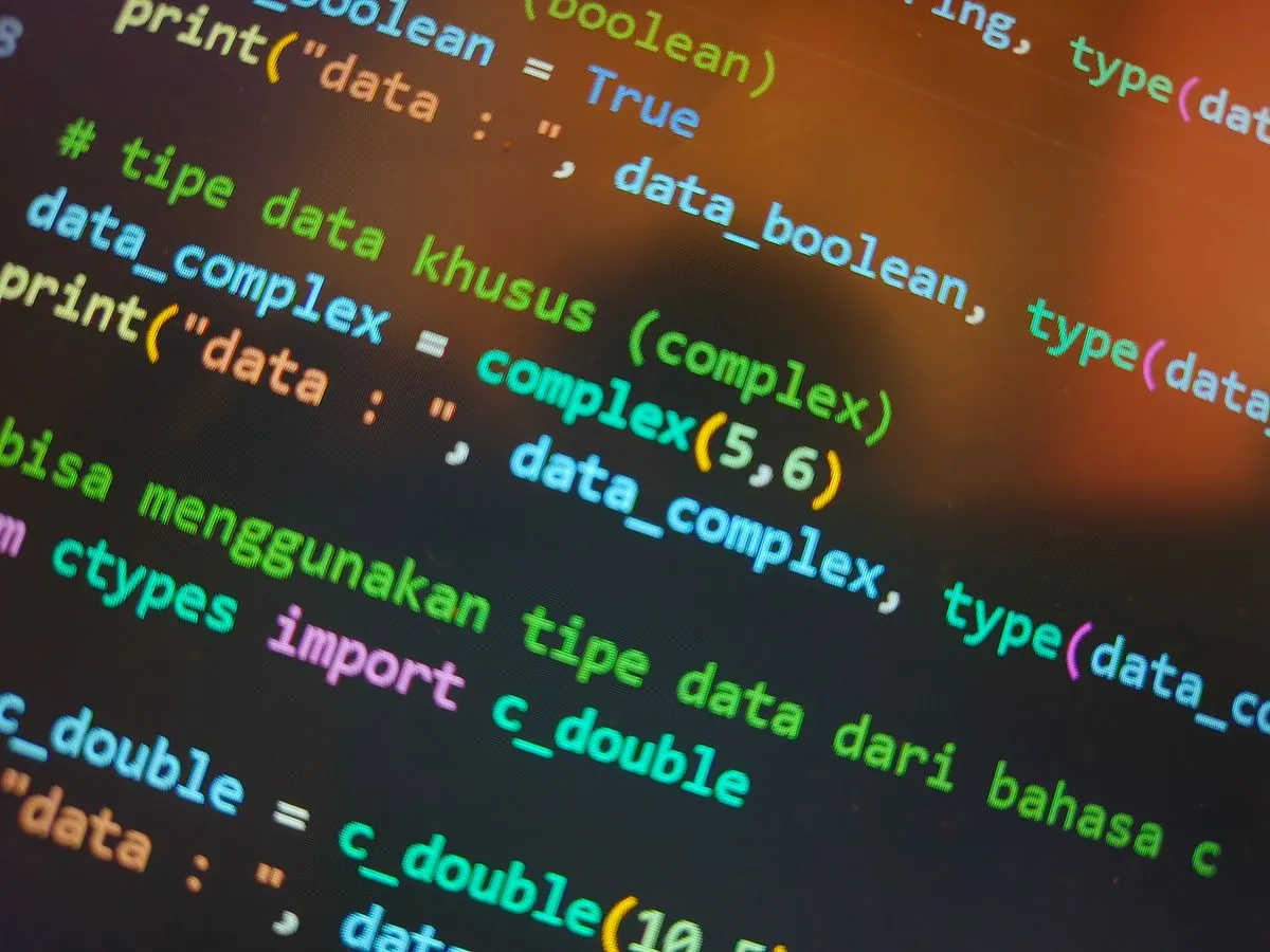 Python source code on a monitor, photographed close up at an angle